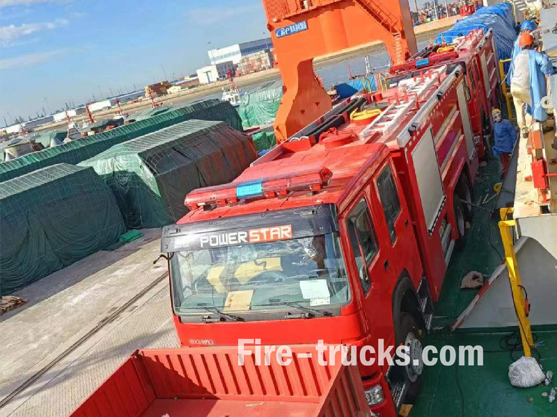 HOWO fire fighting truck loading on board HOWO fire fighting truck loading on board
